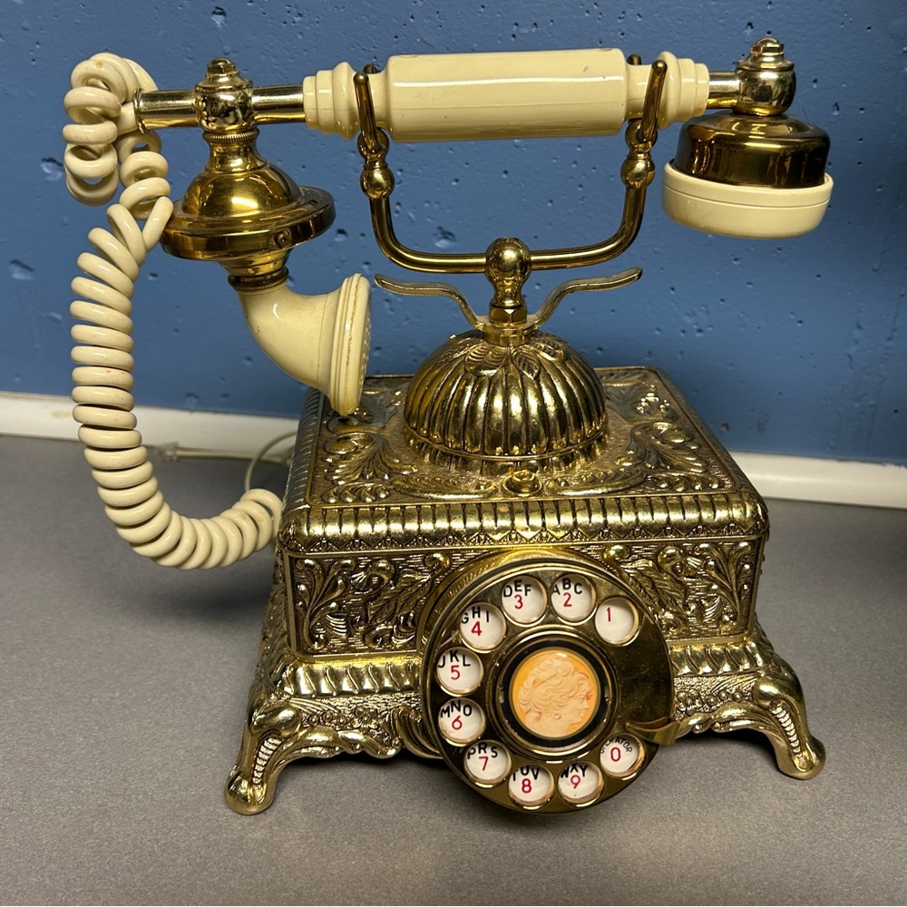 This is a vintage Baroque Monarch rotary telephone